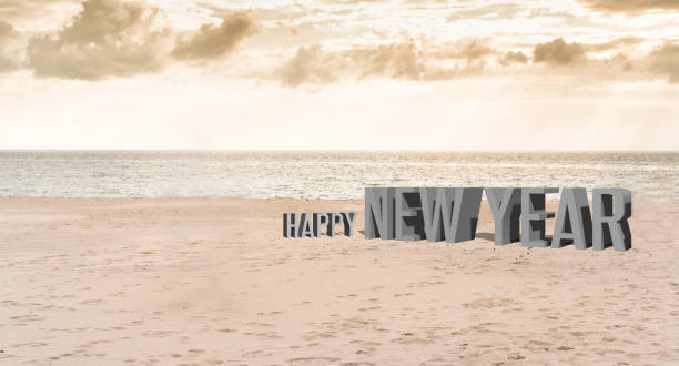 istock Writing happy new year on the sand 1052204940