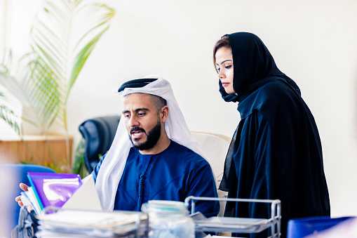 Business, Equality, Opportunity, Businesswoman, Dubai - Emirati Nationals Working Together on a New Business Plan at their Office