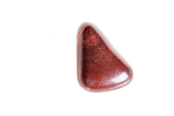 istock Macro mineral stone jasper on a white background 1052206464