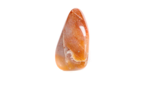 istock Macro mineral stone Carnelian on white background 1052206506