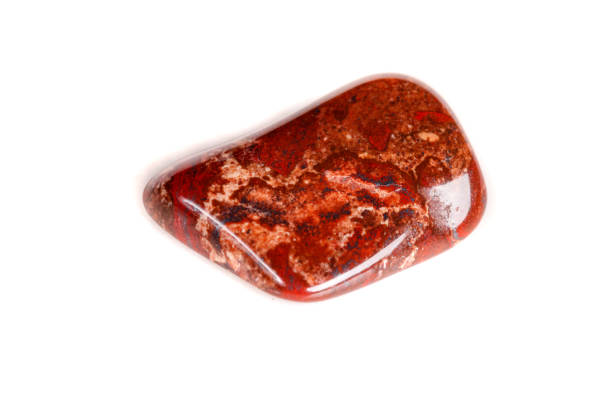 istock Macro mineral stone jasper on a white background 1052206610