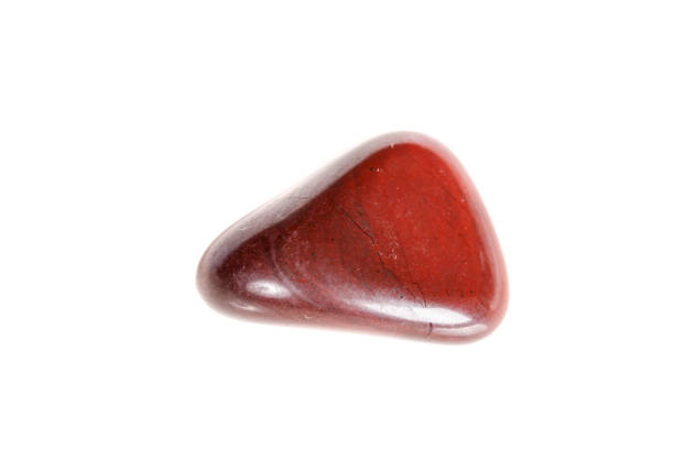istock Macro mineral stone jasper on a white background 1052206630