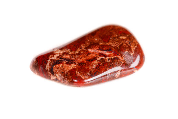 istock Macro mineral stone jasper on a white background 1052206928