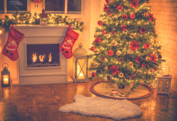 istock Christmas Tree Near Fireplace at Home 1052211720