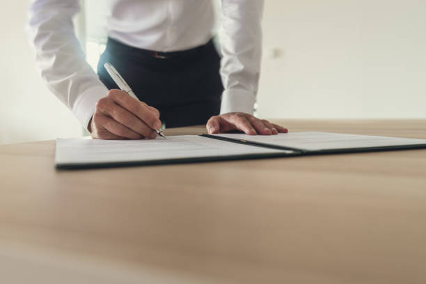 istock Businessman signing agreement 1052235662