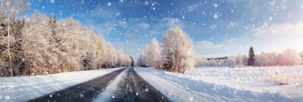 istock winter road, covered with snow on sunny day 1052273754