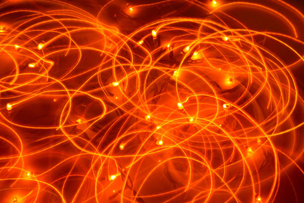 istock minimal holiday concept, garland bulbs glow in the dark on long exposure, light circles 1052276490