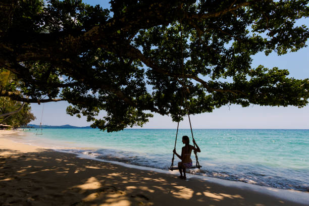 istock Girl on swing Koh Kood 1052277698