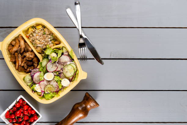 istock Brazilian lunch box. Ahead meal preparation or dieting concept. top view. 1052277960