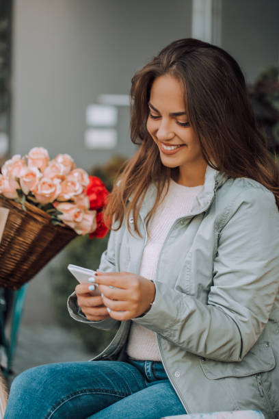 istock Woman reading a text message on smartphone 1052309392