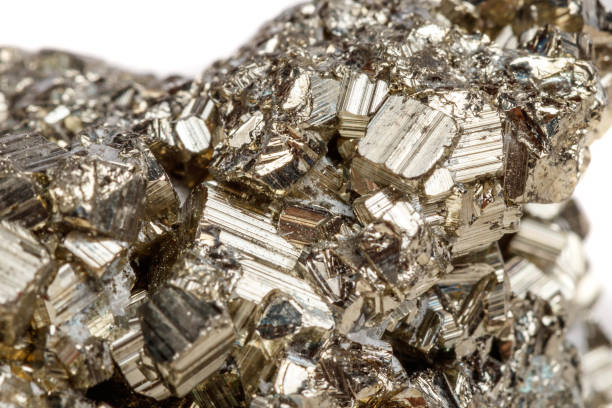 istock Macro mineral stone Pyrite gold on white background 1052311630