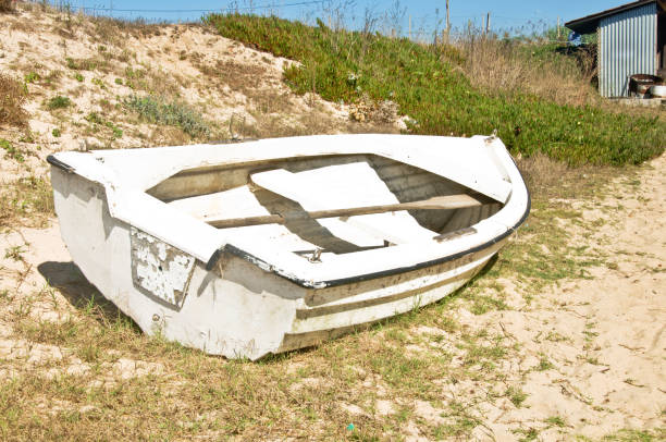 istock Old Abandoned Boat By A Seaside 1052331874
