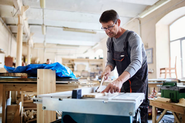 istock Adult craftsman working in joinery 1052336828