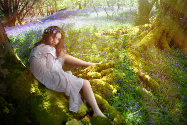 istock Young girl in magical forest 1052343742