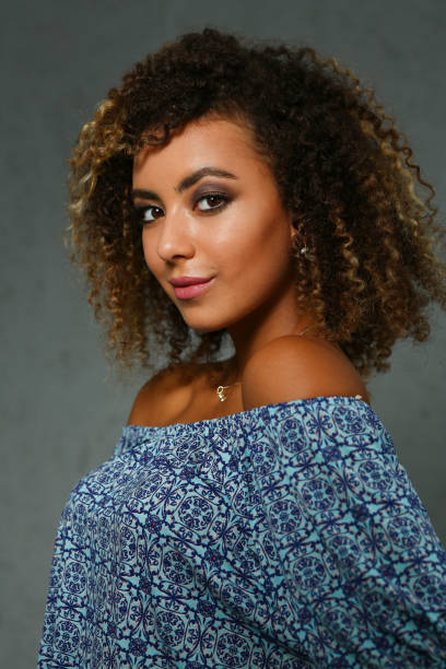 istock Beautiful black woman portrait. Worth a gray 1052346066
