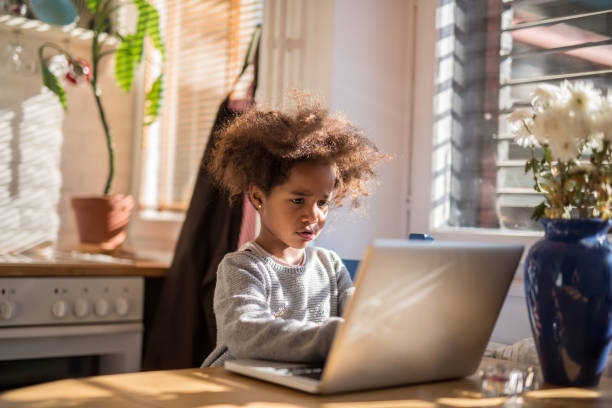 istock She's already learning the ways of technology! 1052349570