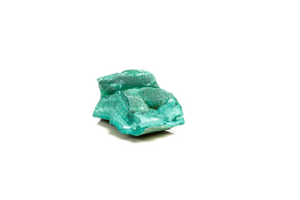 istock Macro mineral stone Malachite in the rock on a white background 1052352212