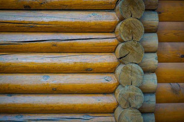 istock Texture of a brown log house 1052360542