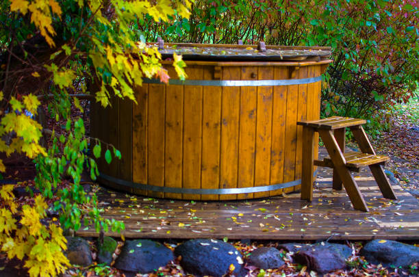 istock Wooden hot tub with a ladder 1052363572