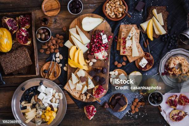 Assorted Cheeses Fruits Nuts Platter Stock Photo - Download Image Now - Christmas, Table, Food