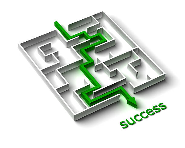 istock White maze with green arrow going to success 105238562