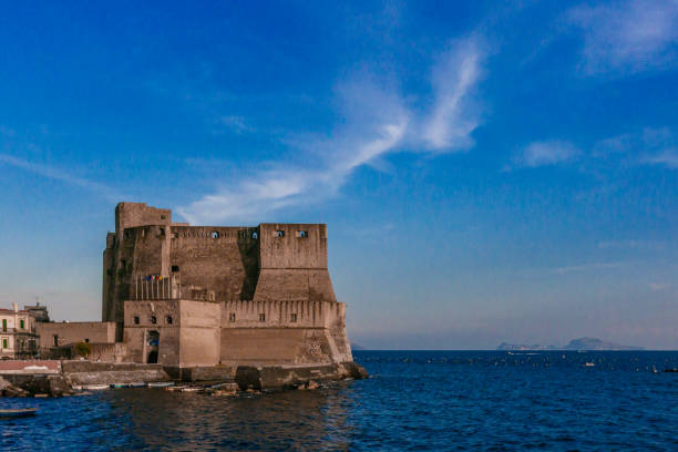 View of the Ovo Castle in Naples, Italy at Dusk