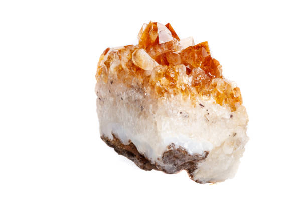 istock Macro mineral stone Citrine in rock in crystals on a white background 1052389732