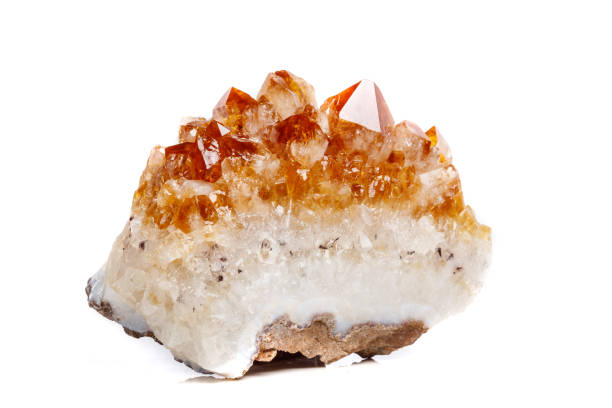 istock Macro mineral stone Citrine in rock in crystals on a white background 1052389950