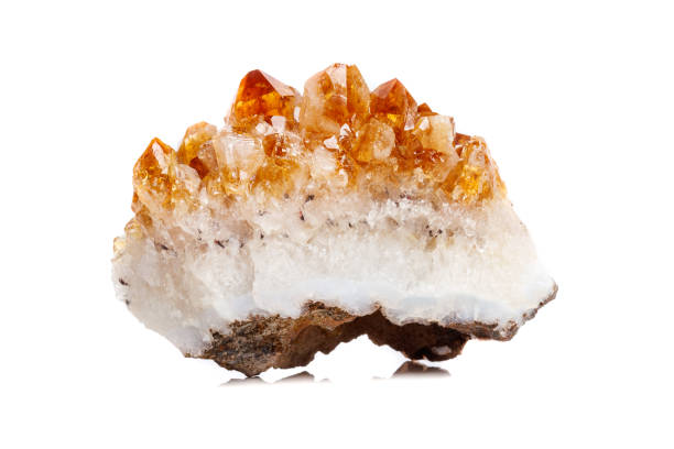 istock Macro mineral stone Citrine in rock in crystals on a white background 1052390090