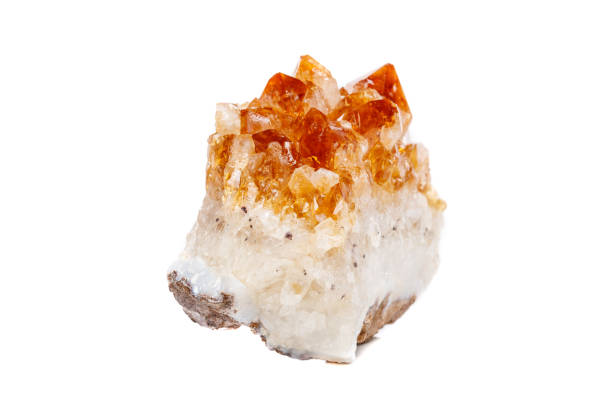 istock Macro mineral stone Citrine in rock in crystals on a white background 1052390126