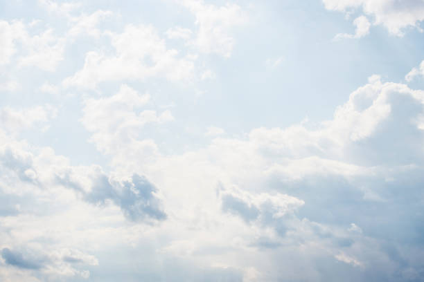 istock Cloudy blue sky on a sunny summer day, Latvia 1052390154