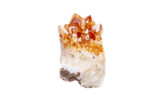 istock Macro mineral stone Citrine in rock in crystals on a white background 1052390570