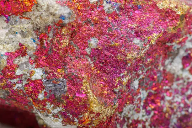 Macro mineral stone Chalcopyrite in the rock on a white background close up