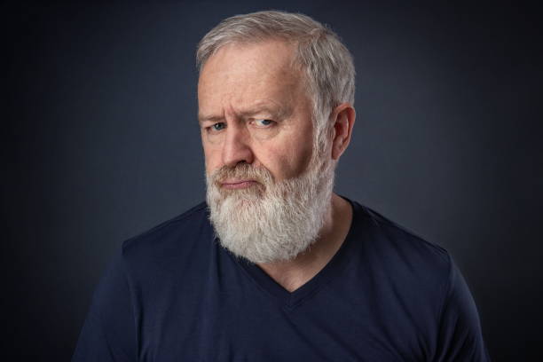 istock Portrait of an angry old man 1052395292