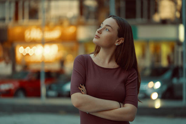 istock Beautiful lonely girl dreaming and thinking 1052396338
