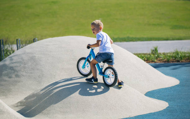 istock Little boy playing on the playground 1052396582