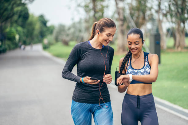 istock Runner girls watching a smart watch 1052407112