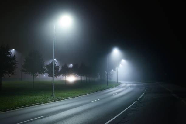 istock A view of the empty highway with lights at night 1052424066