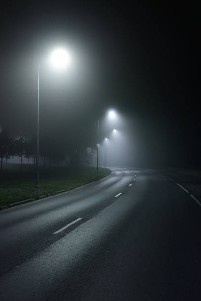 istock A view of the empty highway with lights at night 1052424078
