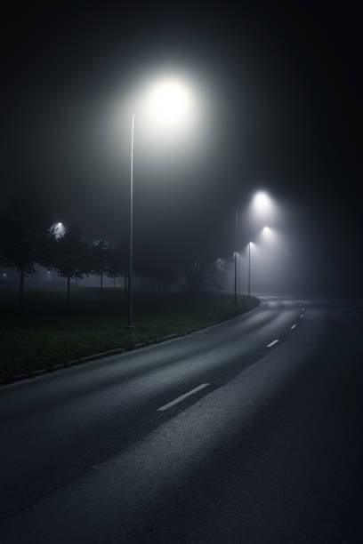 istock A view of the empty highway with lights at night 1052424082