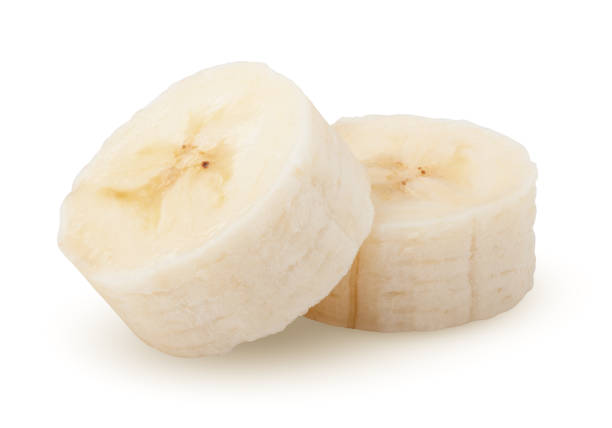 istock banana slice isolated on white background, clipping path, full depth of field 1052438154