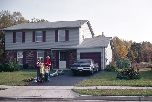 Ohio (exact location unfortunately not known), USA, 1976. The American Dream: house, car, property and family.