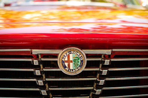Berlin, Germany- june 09, 2018: Car design detail and ALFA ROMEO logo / brand name on grill closeup at Oldtimer automobile event in Berlin