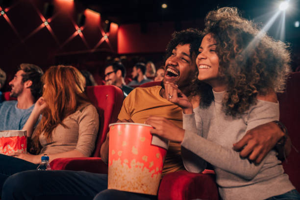 istock Smiling couple in love at cinema 1052500666