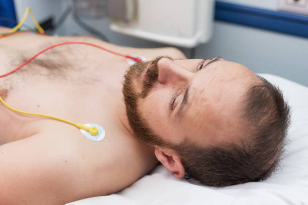 istock ecg electrodes on patient chest in ambulance 1052570920