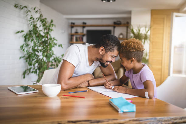 istock Cheerful father and daughter spending time together during breakfast 1052571194