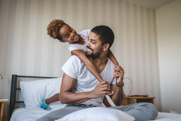 istock Daughter having fun with father in the morning 1052572428