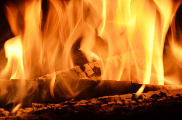 istock burning wood close-up 1052611790