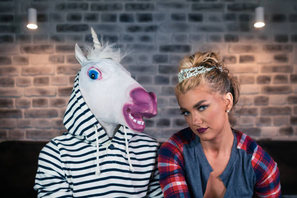 istock Unusual couple looking in the camera 1052664272