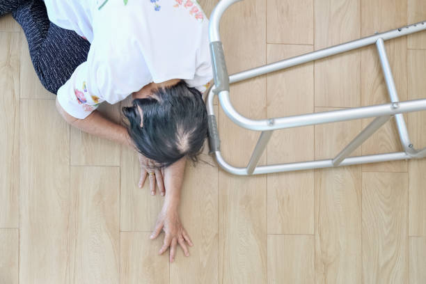 istock Elderly woman falling down at home ,hearth attack. 1052762884